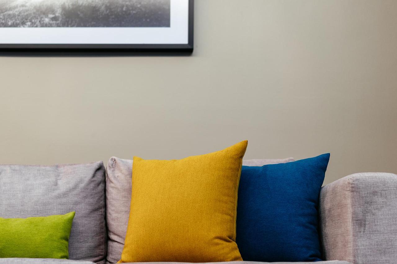 Muu Bangkok, Small Luxury Hotels Of The World Exterior photo Throw pillows on a sofa